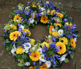 Spring wreath. Bright and bold in blue, yellow and white, this wreath is a popular choice.