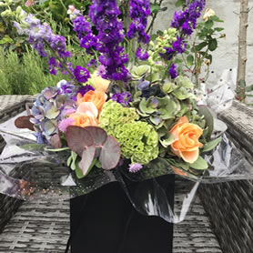 Florist's choice. Contemporary gift bouquet of best available seasonal flowers.