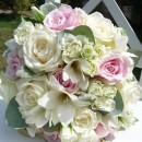 Bridal bouquet of ‘Avalanche’ roses and freesia