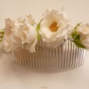 Hair comb of garden spray roses and lily of the valley