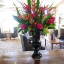 Giant black contemporary urn pictured at the Old Ship Hotel