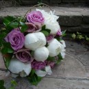 Hand tied bridal bouquet of ‘Cool Water’ roses, vintage ‘Amnesia’ roses and white peonies.