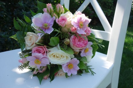 Hand tied bridal bouquet of large headed ‘Avalanche’ roses