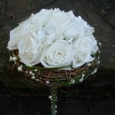 Bridal bouquet of roses with willow