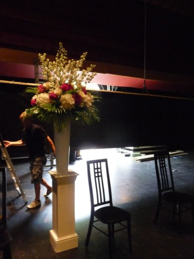 Summer flowers set on the stage at Brighton Dome