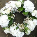 Large white funeral wreath